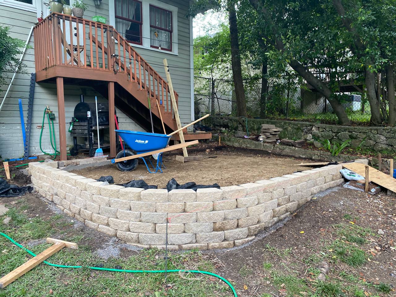 Construction progress showing the completed wall and base